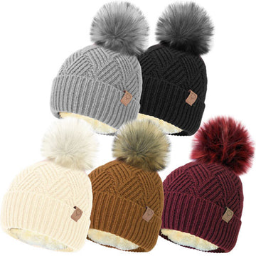 Ladies thermal lined woollen knit bobble hat.